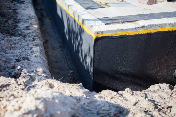 Professional Foundation Crack Repair technician working in Houston, PA